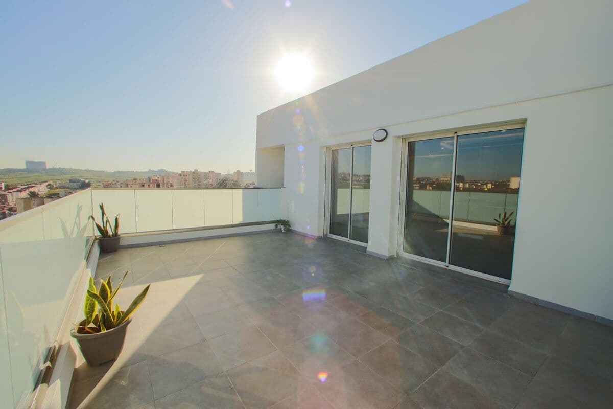 Appartement en attique avec grande terrasse